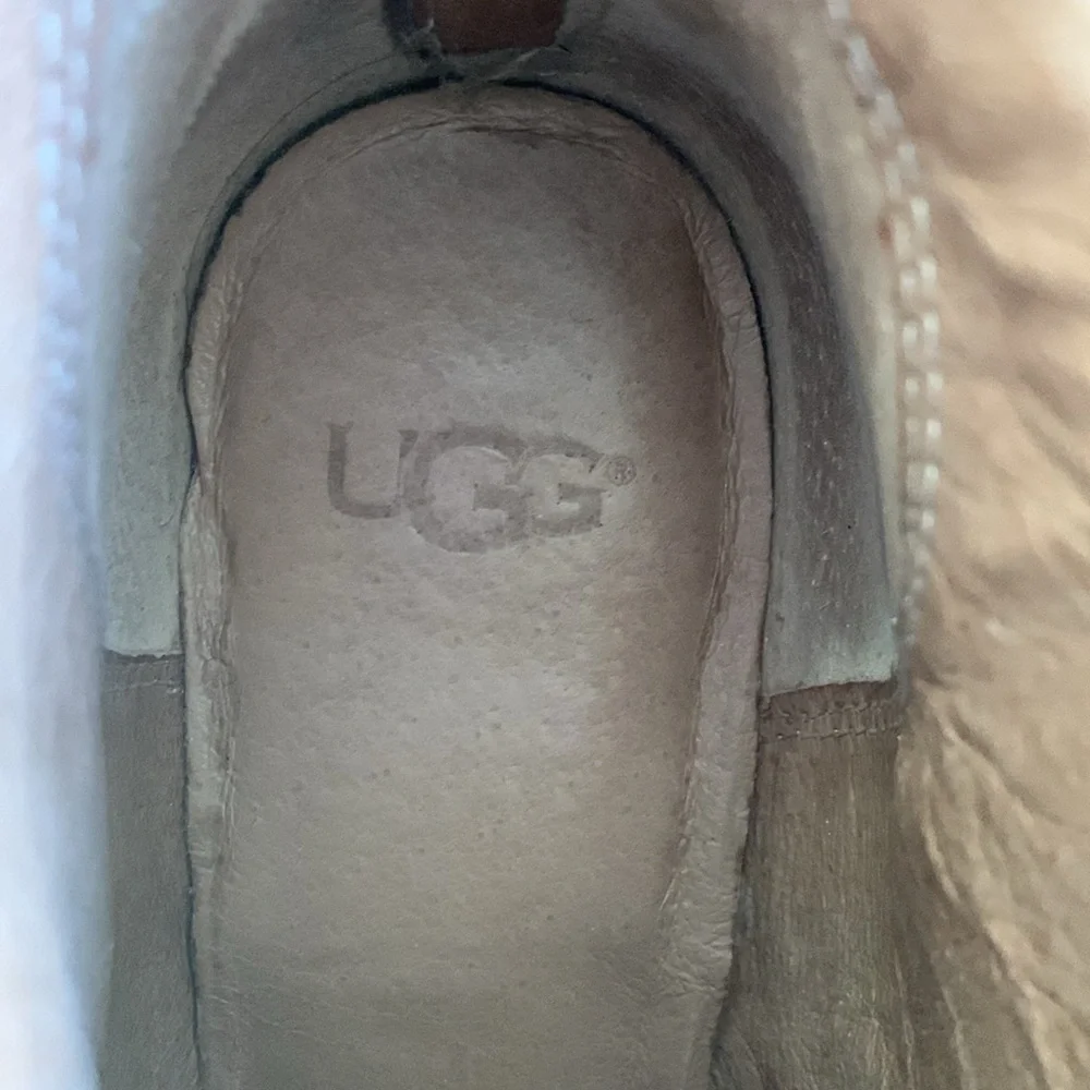UGG sz 9 taupe heeled booties with front fringe and rubber heel
